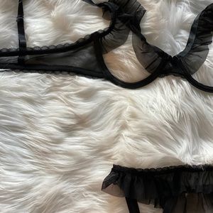 Black ruffle bra and garter belt lingerie set